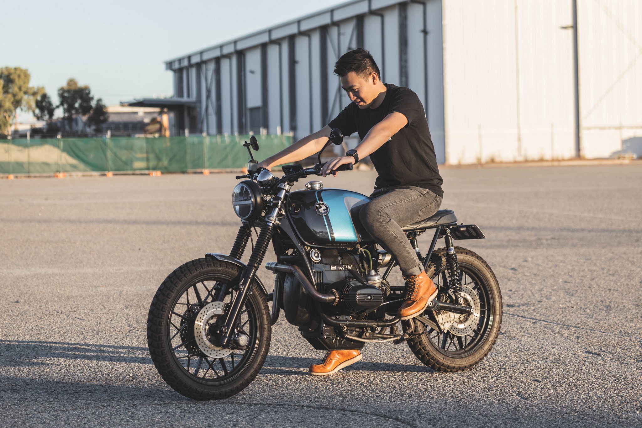 BMW Street Scrambler with man and shed
